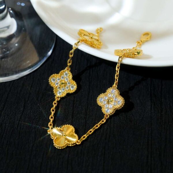 Inlaid with diamonds and five flower gold-colored interlaced bracelet
