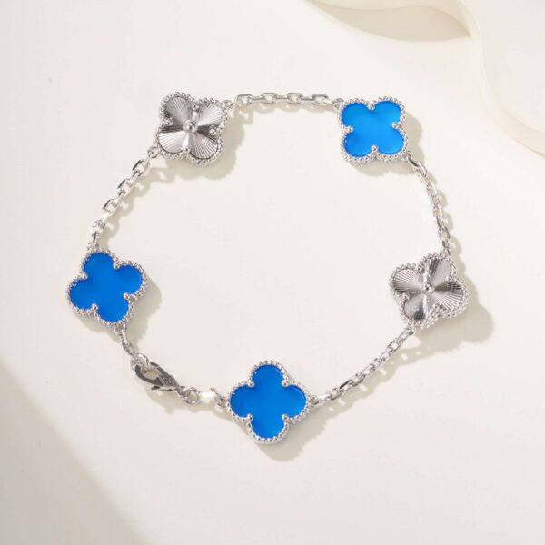 Carved white and golden blue chalcedony bracelet