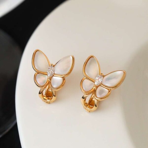 Butterfly Chionodoxa Horse Eye Stone Ear Clip