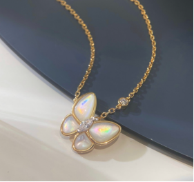 White mother-of-pearl necklace with diamond inlays and a butterfly design