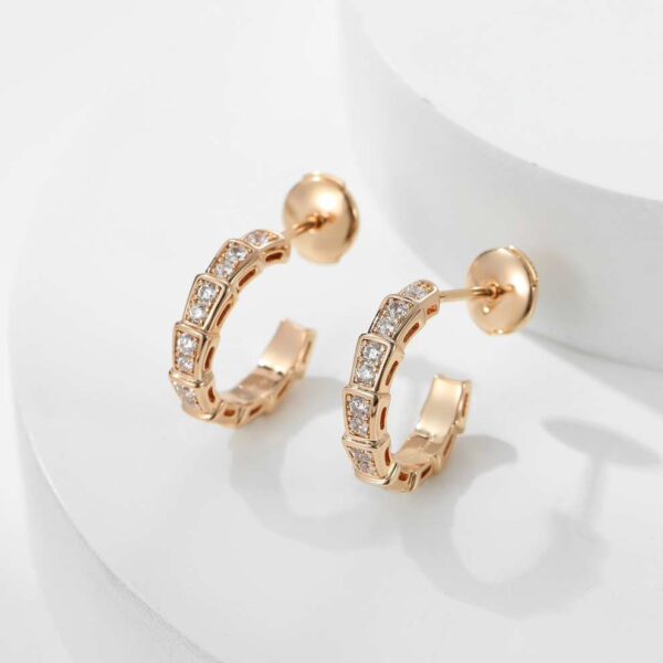 Snake-shaped earrings with full diamonds