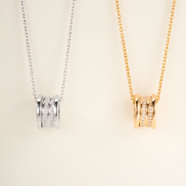 Spring-shaped spiral necklace with diamonds embedded in the middle